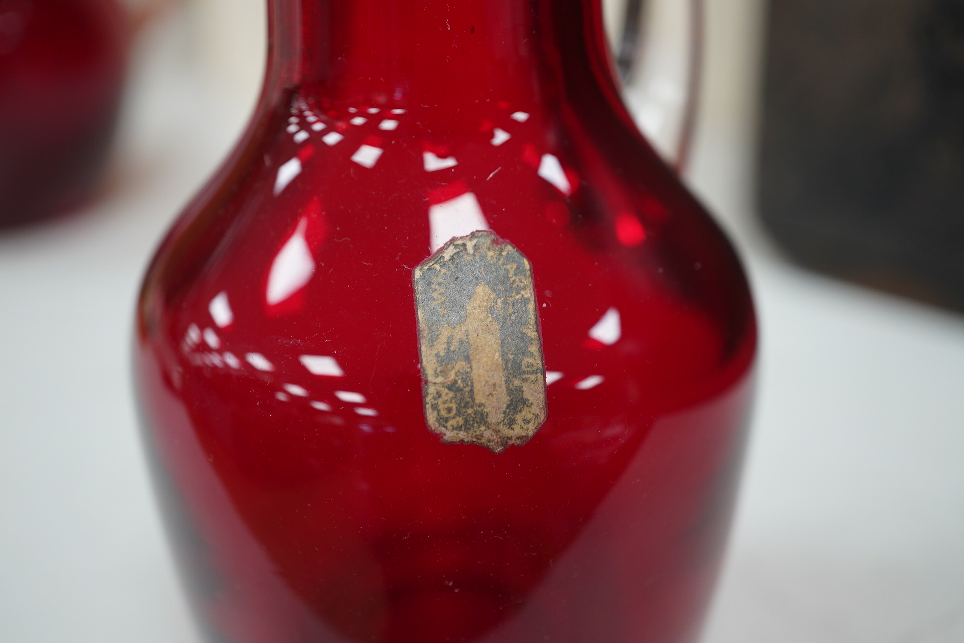 Seven red glass vases including Whitefriars, tallest 21cm high. Condition -good